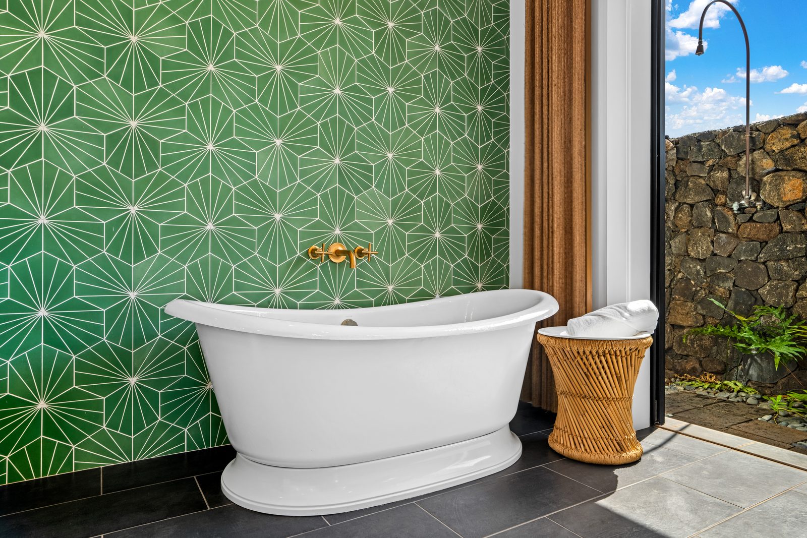 Green Room bathroom with twin vanities, a walk-in shower and green star-patterned tile
