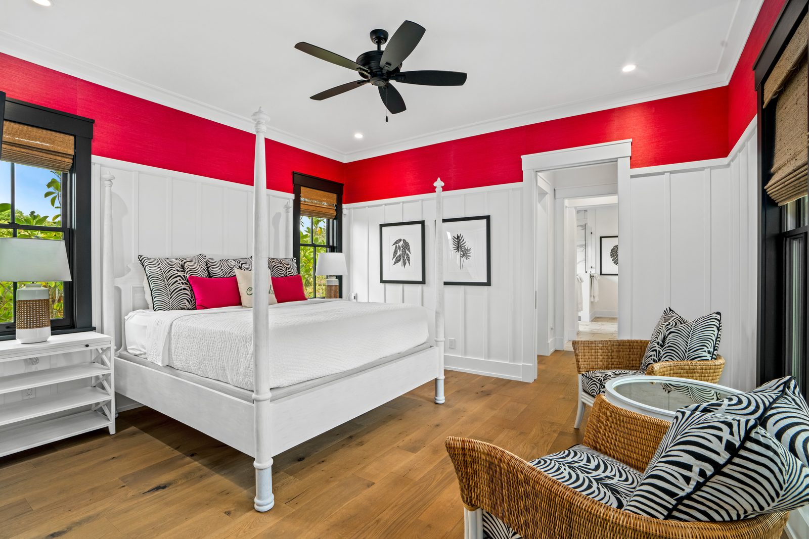 Coral Room with a white four-poster bed beneath a band of coral
